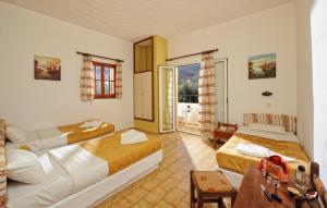 Postel nebo postele na pokoji v ubytování Stelios Residence Apartments