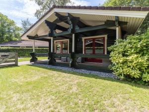 Zahrada ubytování Chalet in Hulshorst near Lake + 26 fotografií
