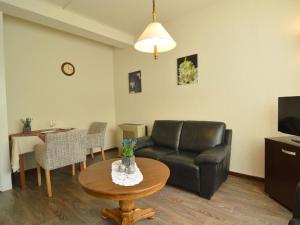 Un lugar para sentarse en Homely Apartment in Schin op Geul with Terrace