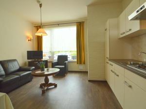 Una cocina o kitchenette en Homely Apartment in Schin op Geul with Terrace