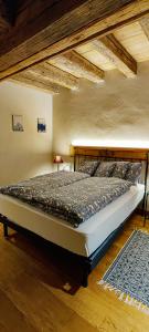 Postel nebo postele na pokoji v ubytování Hôtel St-Georges Romont