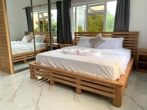 Postel nebo postele na pokoji v ubytování CAM Getaway Villa