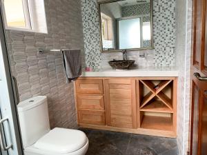 Koupelna v ubytování CAM Getaway Villa + 7 fotografií