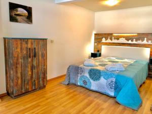 Ein Bett oder Betten in einem Zimmer der Unterkunft Villa Sturm Rüdesheim am Rhein