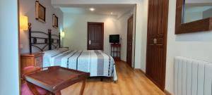 Postel nebo postele na pokoji v ubytování Hotel Rural la Plaza