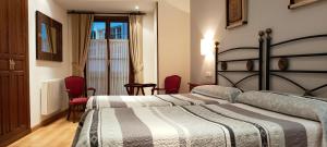 Postel nebo postele na pokoji v ubytování Hotel Rural la Plaza