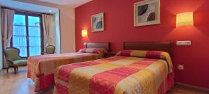 Postel nebo postele na pokoji v ubytování Hotel Rural la Plaza