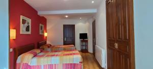 Postel nebo postele na pokoji v ubytování Hotel Rural la Plaza