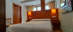 Postel nebo postele na pokoji v ubytování Hotel Rural la Plaza