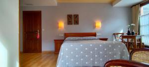 Postel nebo postele na pokoji v ubytování Hotel Rural la Plaza