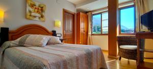 Postel nebo postele na pokoji v ubytování Hotel Rural la Plaza