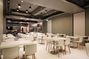 Veitingastaður eða matsölustaður á Dandy Hotel-Daan Park Branch