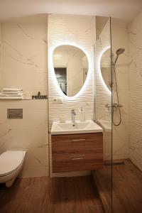 ห้องน้ำของ City Apartment Cipariu