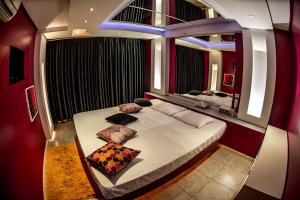 Ένα ή περισσότερα κρεβάτια σε δωμάτιο στο Motel Paradiso Panambi
