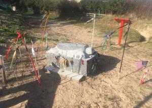 a playground with a play structure in the sand at Villa kahlo Omaha Beach in Colleville-sur-Mer