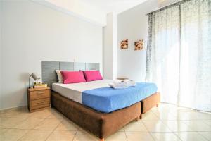 Ένα ή περισσότερα κρεβάτια σε δωμάτιο στο Chania Central Flat