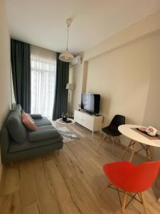 Posezení v ubytování Sol's M2 White Modern Apartments