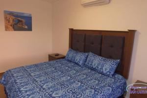 Postel nebo postele na pokoji v ubytování Departamento Topacio 2 Joyas del mar San Carlos + 29 fotografií