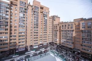 an aerial view of a city with tall buildings at Welcome Home Apartments Baikalskaya 107 in Irkutsk