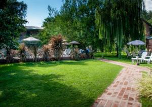 Windmuhle Apart Hotel & Spa外面的花园
