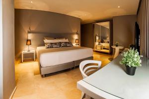 Ένα ή περισσότερα κρεβάτια σε δωμάτιο στο Oz Hotel Cartagena