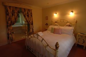מיטה או מיטות בחדר ב-Lisson Grove