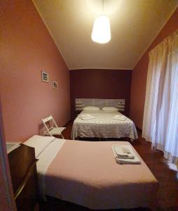 Postel nebo postele na pokoji v ubytování Acquamarina
