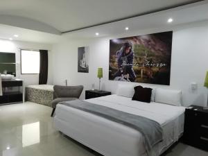 Postel nebo postele na pokoji v ubytování Essenzia de Cancun