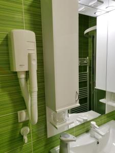 Kúpeľňa v ubytovaní Apartmani Peyton + 32 fotografií