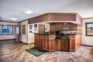 a lobby of a waiting room with a counter at Quality Inn & Suites in Missoula