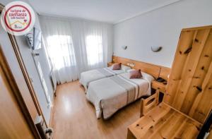 Postel nebo postele na pokoji v ubytování Alvi