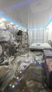 Ένα ή περισσότερα κρεβάτια σε δωμάτιο στο Видовая 25й этаж. Новый дом. Шалимова, ISIDA. Шулявская, Гарматная, Индустриальный мост. Космополитан. Большевик. Жд вокзал.