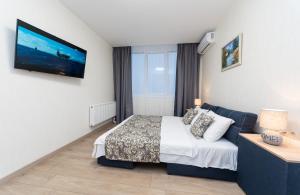 Ліжко або ліжка в номері Apartments Riviera