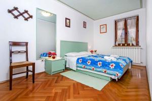 Rúm í herbergi á Apartment in Rovinj with Two-Bedrooms 5