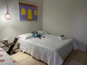 Giường trong phòng chung tại Pousada Água do Mar