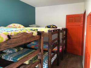 Ein Etagenbett oder Etagenbetten in einem Zimmer der Unterkunft XaviHostel