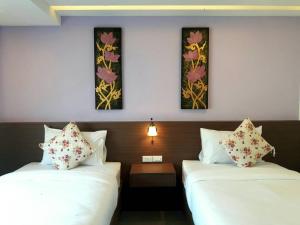 Lova arba lovos apgyvendinimo įstaigoje Vista Hotel Chiang Mai - SHA EXTRA PLUS