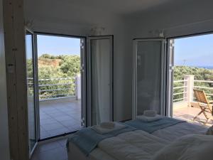 Posteľ alebo postele v izbe v ubytovaní Villa in Finiki with Stunning Sea Views