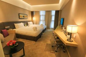 Postel nebo postele na pokoji v ubytování Skytel Hotel Chengdu-City Center + 37 fotografií