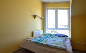 Postel nebo postele na pokoji v ubytování Apartament na Morenie Gdańsk