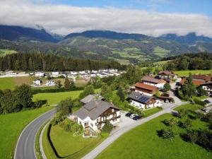 an aerial view of a house in the mountains at Sonneck Pension in Pfarrwerfen