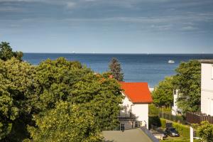 a view of the ocean from a house at Sky and Sea by Renters Prestige in Sopot