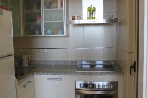 Kuchyňa alebo kuchynka v ubytovaní GEMELOS 26 APARTMENTS - Benidormland