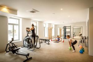 a group of people exercising in a gym at Hotel Imperial - Liburnia in Opatija