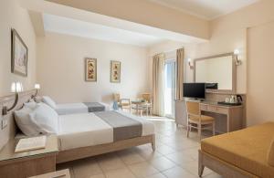 TV a/nebo společenská místnost v ubytování Magda Hotel Club