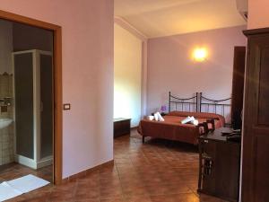 En eller flere senger på et rom på Hotel Sant'elene
