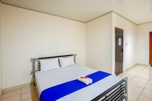 Hotel Bambu Kuning客房内的一张或多张床位