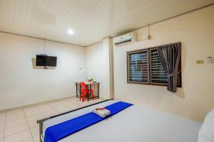 Hotel Bambu Kuning客房内的一张或多张床位