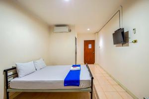 Hotel Bambu Kuning客房内的一张或多张床位