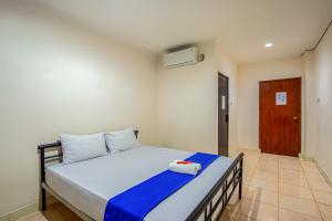 Hotel Bambu Kuning客房内的一张或多张床位